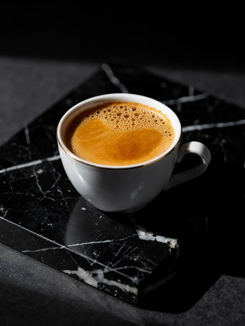 Double shot of espresso in a glass cup